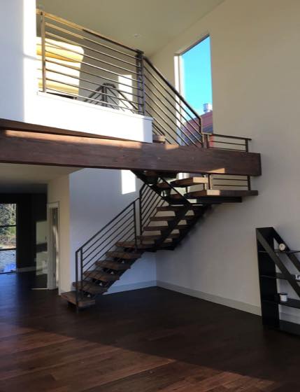 Completed floating staircases for a Clark County home