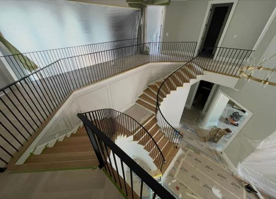 Curved & Grand Stairs fabricated and installed by NW Iron Works in the Portland-Vancouver metro