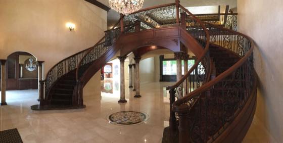 Curved & Grand Stairs project by NW Iron Works — scanned, laser-cut, and installed by our own crew