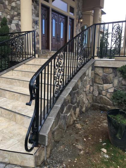 Curved & Grand Stairs fabricated and installed by NW Iron Works in the Portland-Vancouver metro