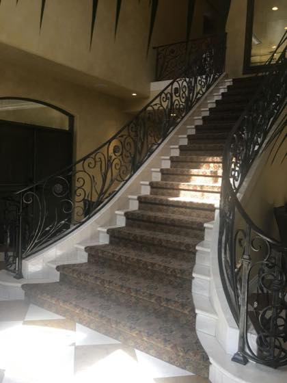 Completed curved & grand stairs for a Clark County home