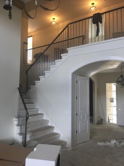 Curved & Grand Stairs project by NW Iron Works — scanned, laser-cut, and installed by our own crew