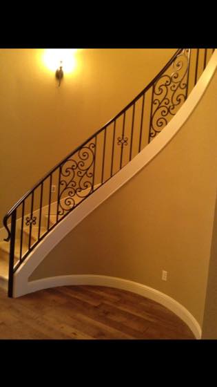 Curved & Grand Stairs project by NW Iron Works — scanned, laser-cut, and installed by our own crew